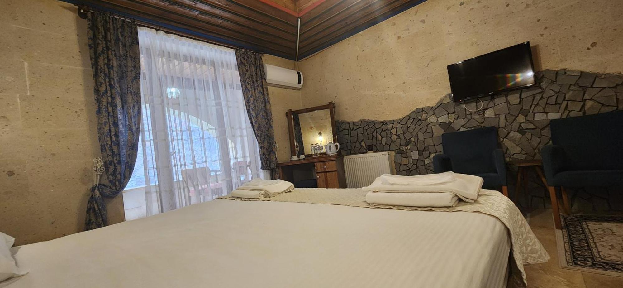 Cappadocia Elite Stone House Bed and Breakfast Göreme Værelse billede